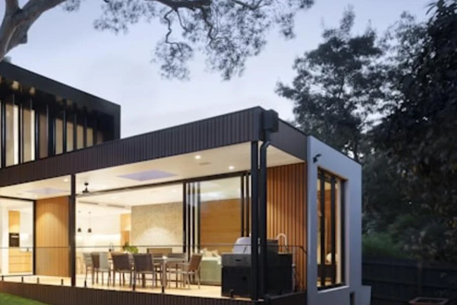 Illustrative context photo of a modern home interior and terrace, not the example listing